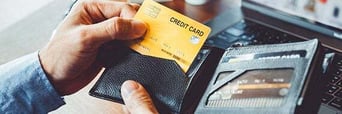 What is the difference between credit and debit cards?